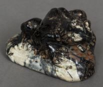 A Chinese carved hardstone model of a frog Naturalistically modelled. 9 cm long.