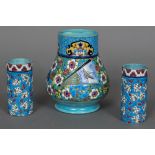 A French faience vase Decorated with various vignettes of birds and boats on a colourful floral and