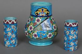 A French faience vase Decorated with various vignettes of birds and boats on a colourful floral and