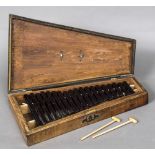 A 19th century satinwood cased Bristol blue glass xylophone Inscribed G.