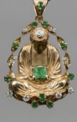 A 14 ct gold, diamond and emerald set pendant/brooch Formed as Buddha, typically modelled seated.
