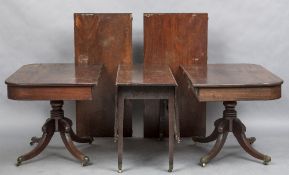 An 19th century mahogany pedestal dining table The D-end pedestals incorporating a central twin