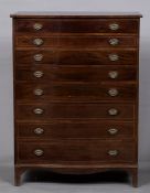 A 19th century line inlaid mahogany serpentine tallboy,