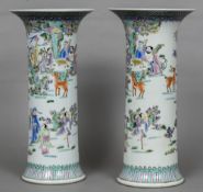 A pair of Chinese porcelain sleeve vases Both with flared rim and decorated with figures in a