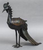 A Chinese bronze and champleve enamelled censor and cover Modelled as an exotic bird. 39.5 cm high.