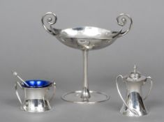 An Arts & Crafts hammered silver twin handled tazza, hallmarked Birmingham 1910,