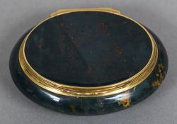 An 18th/19th century gold mounted bloodstone box and cover Of oval form. 7 cm wide.