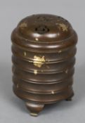 A Chinese bronze gilt splashed censor Of beehive form, the cover pierced, cast mark to base.