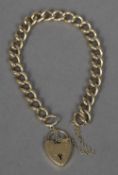 A 9 ct gold curb link bracelet Set with a padlock clasp. Approximately 20 cm long.