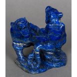 A Chinese carved lapis lazuli model of two tigers 9.5 cm high.