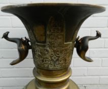 A large Chinese Ming bronze vase The flared rim above an archaistic lappet band and a pair of