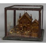 A late 19th/early 20th century country cottage diorama Of typical form, modelled front and back,