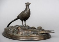 A patinated bronze animalier group Formed as roosting pheasants,