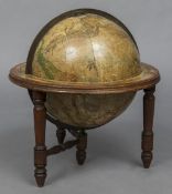 A late 19th/early 20th century celestial globe Of typical form, mounted on a low mahogany stand.