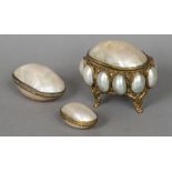 A late 19th century French mother-of-pearl shell mounted casket The hinged lid inscribed Souvenir