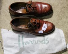 A pair of tan leather Crocket and Jones shoes