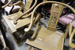 A pair of Chinese open armchairs