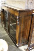 A Victorian rosewood chiffonier (lacking top)