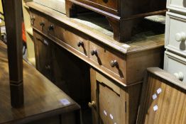 A Victorian pine pedestal desk