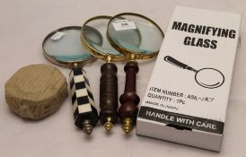Four magnifying glasses