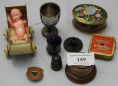 A small quantity of miniature items including a silver trophy cup