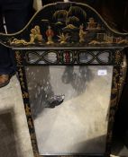 A chinoiserie lacquered wall glass