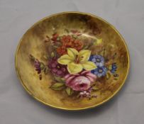 A small Royal Worcester florally painted dish