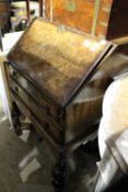 An 18th century style walnut bureau on stand