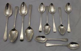 Seven 18th/19th century silver teaspoons together with four George III silver spoons,