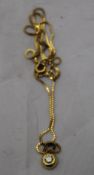 An 18 ct gold diamond pendant with chain