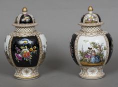 A pair of late 19th century Continental porcelain lidded vases, each of ovoid form,