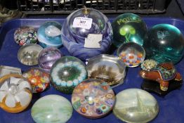 A quantity of paperweights