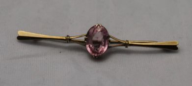 An amethyst bar brooch