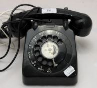 A vintage bakelite post office exchange telephone
