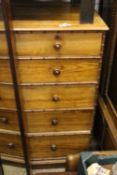 A Victorian pitch pine chest of drawers