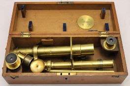 A mahogany cased microscope