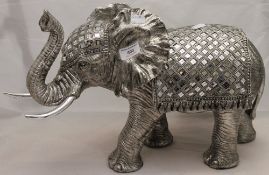 A silvered and mirrored elephant