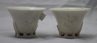 A pair of blanc de chine porcelain Chinese libation cups