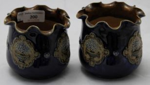 A pair of Royal Doulton stoneware vases