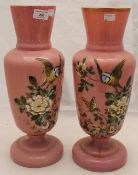 A pair of Victorian painted pink glass vases