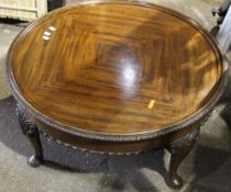 An early 20th century walnut occasional coffee table