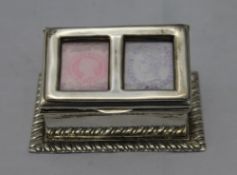A silver stamp box,