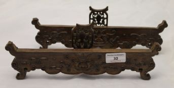 A pair of Chinese carved hardwood plate stands
