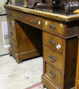 An oak pedestal desk