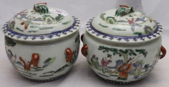 A pair of Chinese scarab handled lidded pots