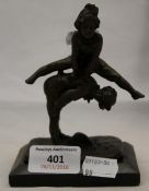 A bronze in the form of children playing leapfrog