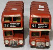Two models of red London buses