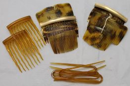 A quantity of tortoiseshell hair combs and grips,