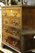 A small 19th century mahogany chest of drawers with a brushing slide