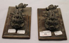 A pair of 19th century cast bronze sea monster mounts